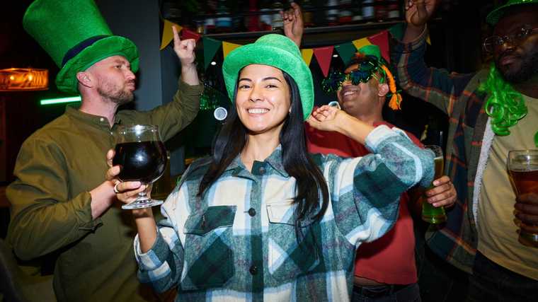 A group of young friends dancing and partying at one of the St. Patrick’s Day celebrations in Chattanooga.