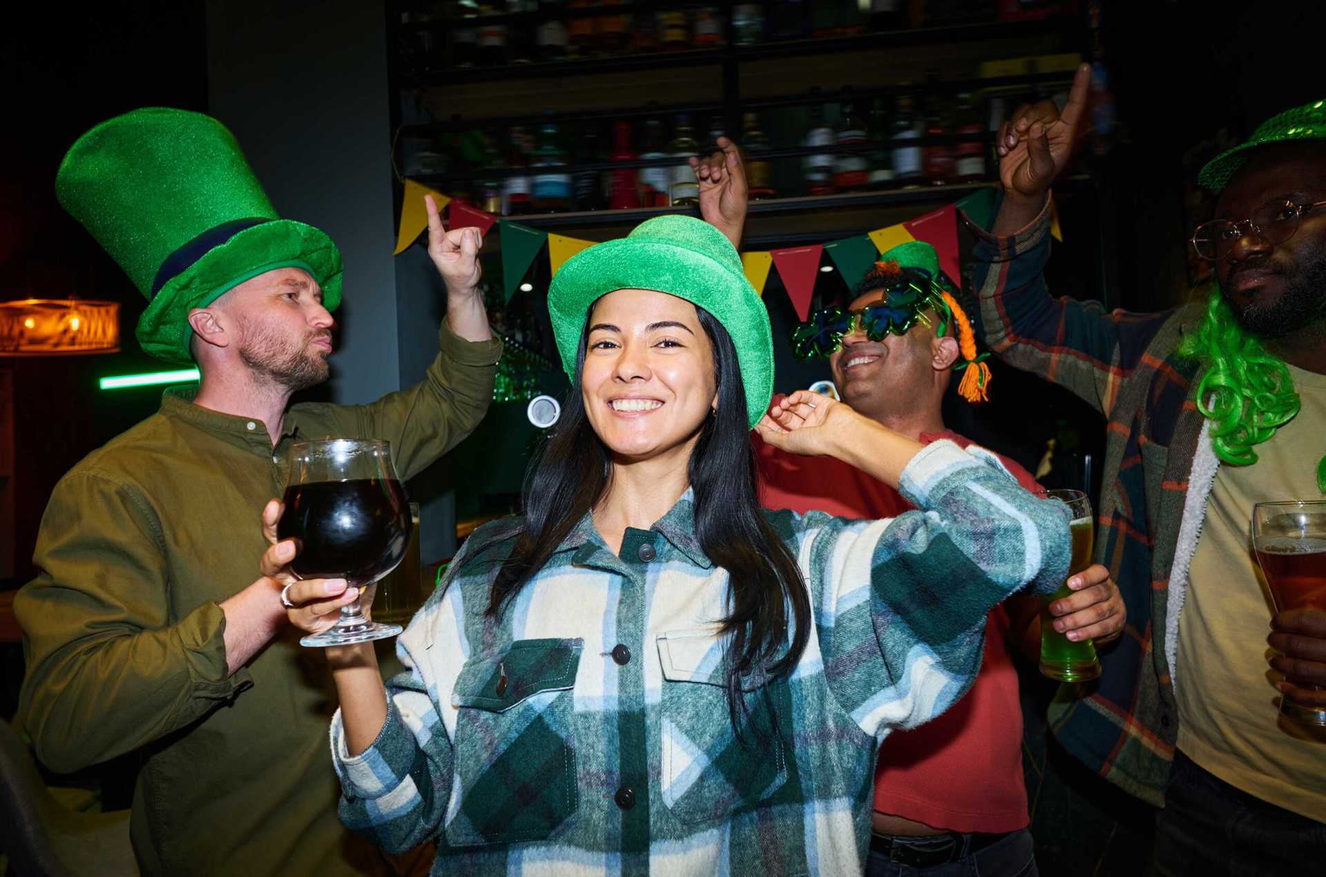 A group of young friends dancing and partying at one of the St. Patrick’s Day celebrations in Chattanooga.